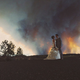 Illustration for article titled Couple Uses Raging Wildfire as Backdrop for Wedding Photos